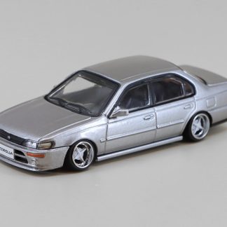 Toyota Corolla AE100 1996 LHD 1:64 - BM Creations Toyota Corolla AE 100 Left Hand Drive - kovový model auta