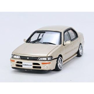 Toyota Corolla AE100 1996 LHD 1:64 Champagne - BM Creations Toyota Corolla AE 100 Left Hand Drive - kovový model auta